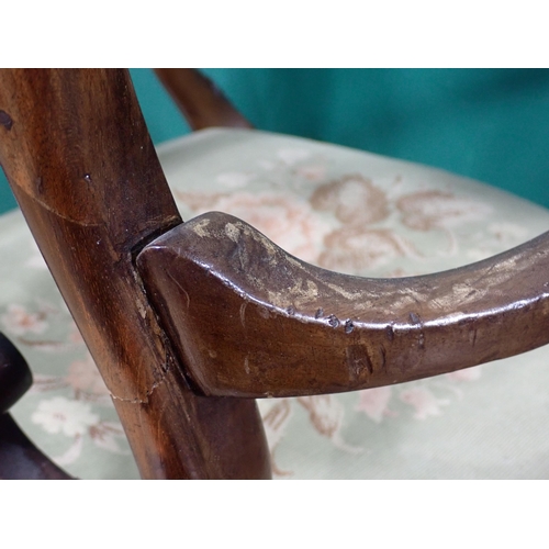 3 - Two Edwardian Elbow Chairs with floral and scroll carved backs, upholstered seats on slender cabriol... 