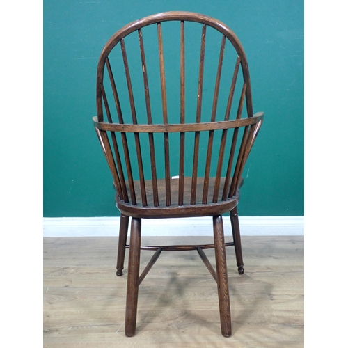 320 - An ash and elm hoop back Elbow Chair 3ft 1in H x 2ft W