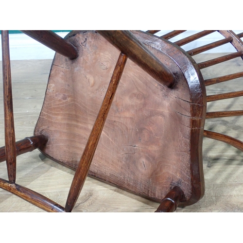 320 - An ash and elm hoop back Elbow Chair 3ft 1in H x 2ft W