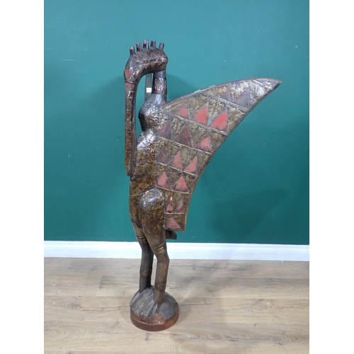 323 - A large Benin style copper covered stylised Figure of a Hornbill 4ft 1in H x 2ft 5in W