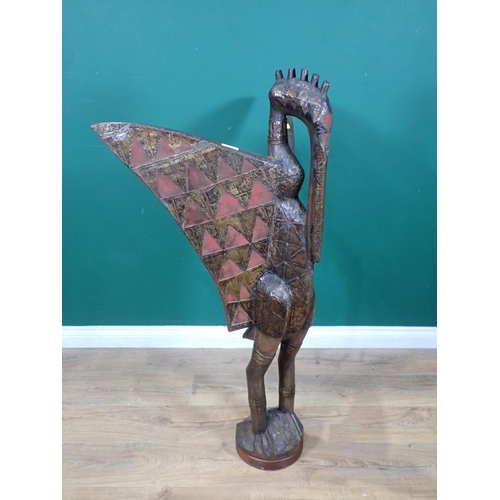 323 - A large Benin style copper covered stylised Figure of a Hornbill 4ft 1in H x 2ft 5in W