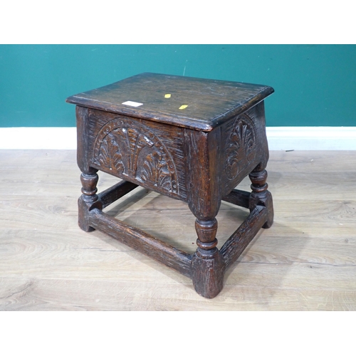 343 - An oak Box Stool in the 17th Century style with leafage carving 1ft 7in W x 1ft 4in H