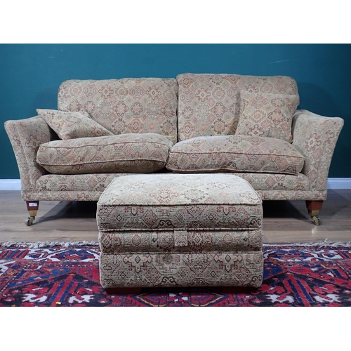 346 - A Parker-Knoll large two seater Sofa 6ft 8in W x 2ft 6in H and a Footstool 2ft 2in W x 1ft 4in H