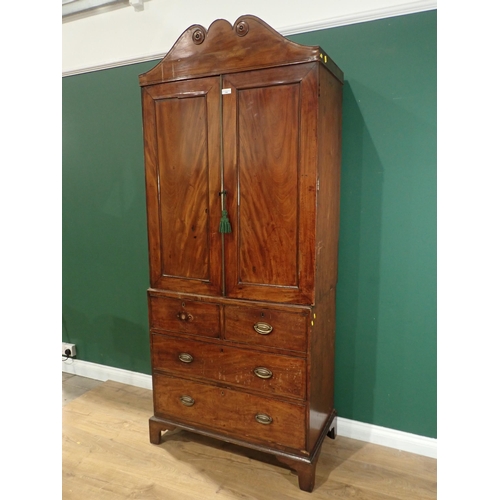 354 - A 19th Century mahogany Linen Press fitted pair of cupboard doors above base fitted two short and tw... 