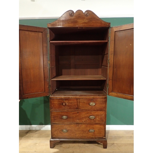 354 - A 19th Century mahogany Linen Press fitted pair of cupboard doors above base fitted two short and tw... 