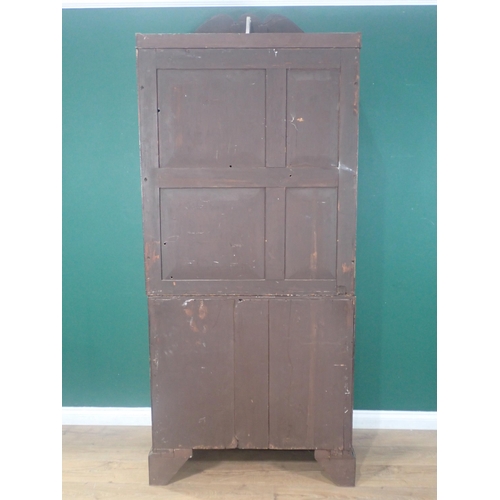 354 - A 19th Century mahogany Linen Press fitted pair of cupboard doors above base fitted two short and tw... 