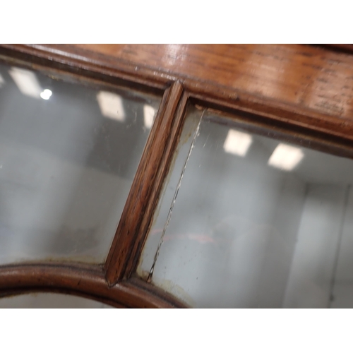 356 - A 19th Century oak and mahogany crossbanded standing Corner Cabinet fitted pair of glazed doors abov... 