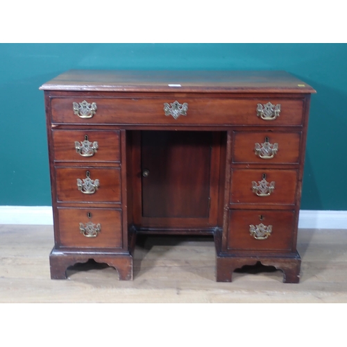 372 - A Georgian mahogany kneehole Desk fitted single frieze drawers and six drawers to pedestals mounted ... 