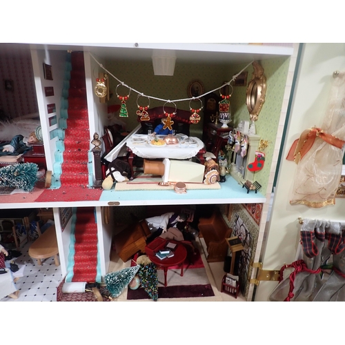 394 - A modern Doll's House with Dolls and Furniture 2ft 8in H x 2ft 4in W