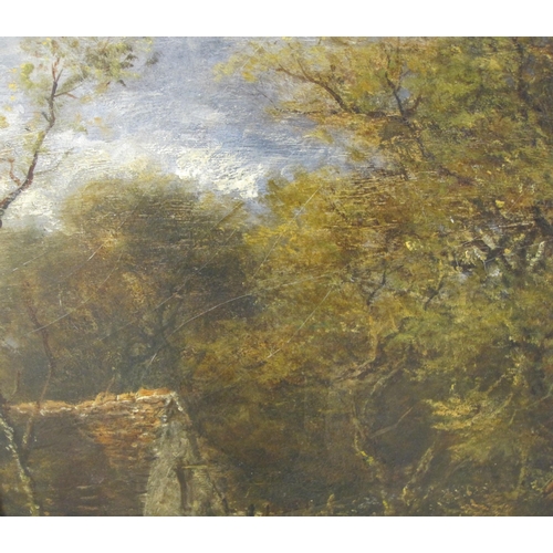 407 - RICHARD ROBERT DRABBLE. A wooded landscape with a figure cutting logs by a mill stream, signed, oil ... 