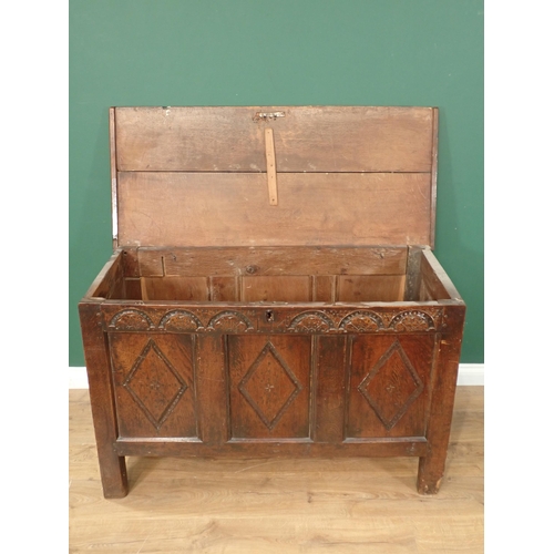 45 - A 17th Century oak Coffer with two plank lid above lozenge carved three panel front 3ft 11in W x 2ft... 