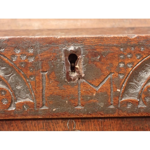 45 - A 17th Century oak Coffer with two plank lid above lozenge carved three panel front 3ft 11in W x 2ft... 