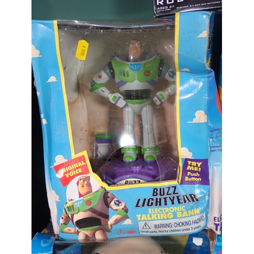 458 - A quantity of boxed characters incl. Buzz Lightyear Talking Bank, a Godzilla Bank, Little Britain Ch... 