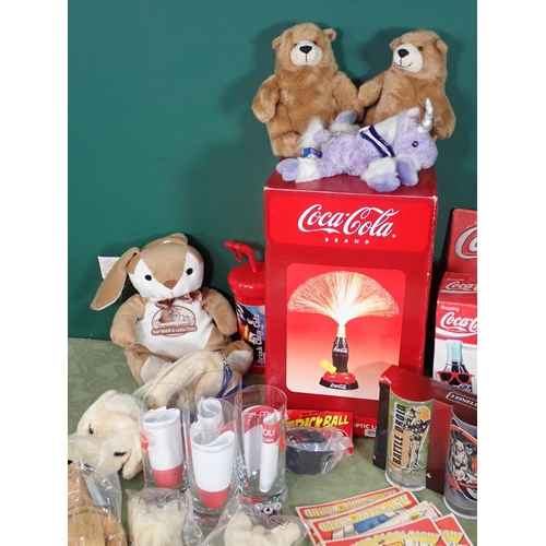 467 - Quantity of Coca Cola Bottles, Glasses, and other advertising items, a box of Beer Mats and Teddy Be... 