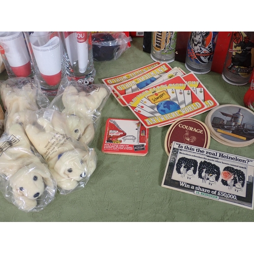 467 - Quantity of Coca Cola Bottles, Glasses, and other advertising items, a box of Beer Mats and Teddy Be... 