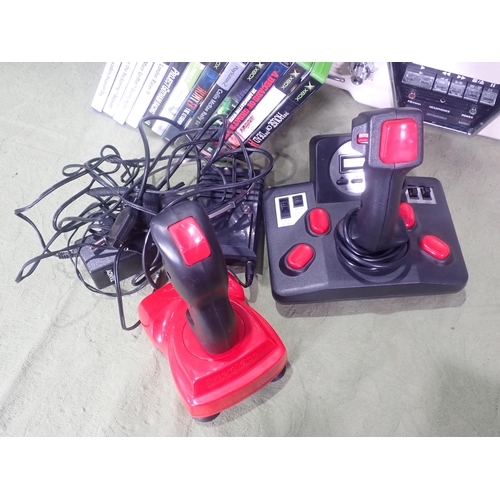 468 - A quantity of boxed Sony Playstation accessories including Charge Dock, Dual Shock 2 remote (wired),... 