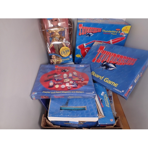 484 - A quantity of Thunderbirds Collectibles and Figures