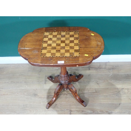 49 - A Victorian walnut and inlaid Games Table on turned column and quadruple base A/F 2ft 3in W x 2ft 3i... 