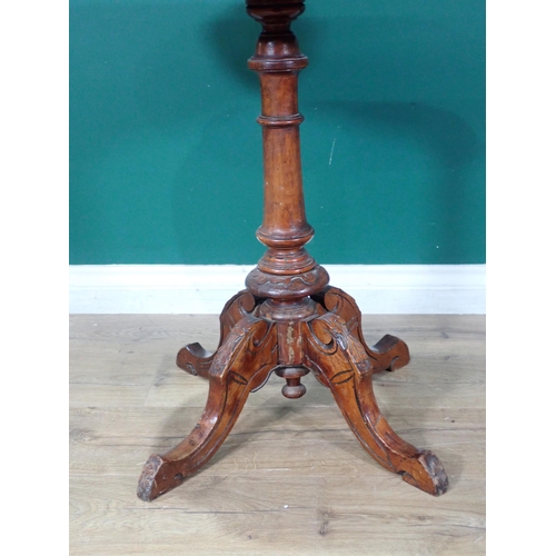 49 - A Victorian walnut and inlaid Games Table on turned column and quadruple base A/F 2ft 3in W x 2ft 3i... 