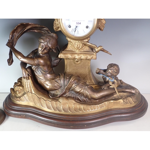 554 - A gilt metal Mantel Clock with reclining girl and cherub in the manner of Moreau, and an Oil Lamp