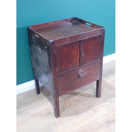 56 - A 19th Century mahogany Wash Stand fitted pair of cupboard doors above single drawer 2ft 6in H x 1ft... 