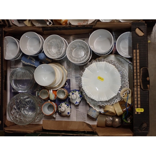 568 - Four boxes of ceramics and cutlery, etc.