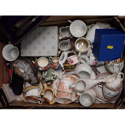 568 - Four boxes of ceramics and cutlery, etc.