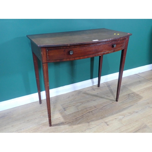 59 - A 19th Century mahogany bow fronted Side Table fitted single frieze drawer mounted upon square suppo... 