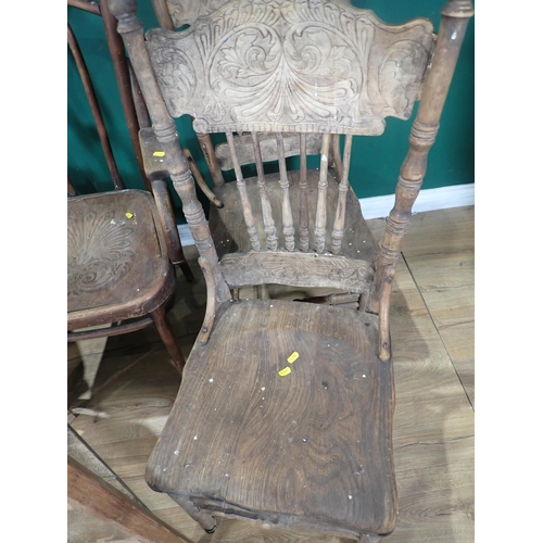 60 - A Victorian walnut framed open Armchair, two American style single Chairs A/F, a bentwood Elbow Chai... 