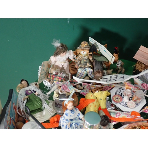 601 - A Doll's Diorama, a Fete Display on table, a quantity of Dolls and Books