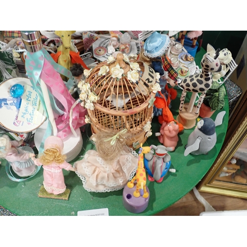 601 - A Doll's Diorama, a Fete Display on table, a quantity of Dolls and Books