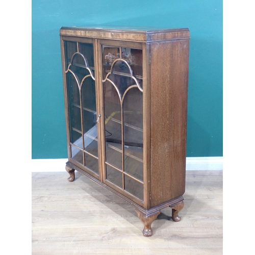 604 - A mahogany and glazed two door Bookcase enclosing adjustable shelves 3ft 6in H x 2ft 10in W