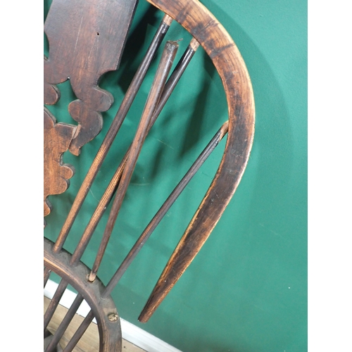 631 - A 19th Century ash Windsor Elbow Chair with pierced splat back A/F 3ft 9in H x 2ft 1in W