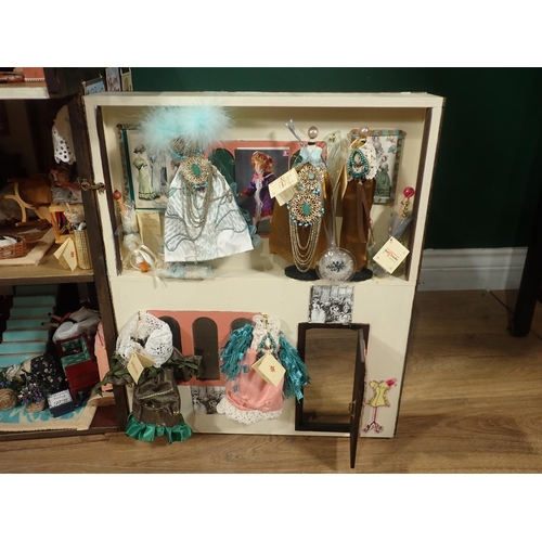 646 - A timber framed style Doll's House 'Griffindor' with Dolls and Furniture 2ft 9in H x 1ft 6in W