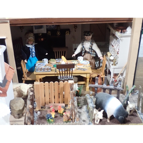 647 - A modern Doll's Farmhouse 'The Homestead' with Figures, Animals and Magazines. Based on a property n... 