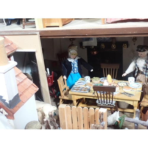 647 - A modern Doll's Farmhouse 'The Homestead' with Figures, Animals and Magazines. Based on a property n... 