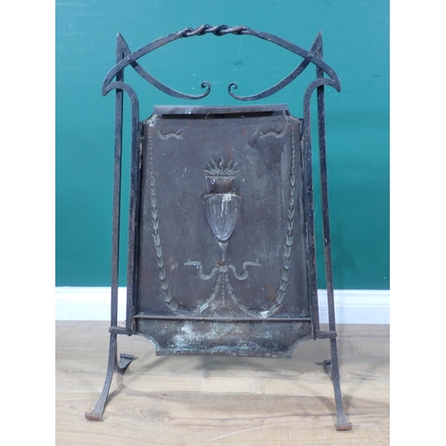 653 - An Arts and Crafts copper Fire Screen with relief design of urn 2ft 8in H x 1ft 6in W