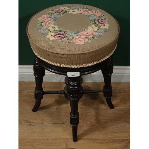 657 - A Victorian ebonised revolving Piano Stool