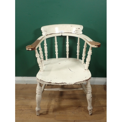 659 - An antique white painted Smoker's Bow Armchair