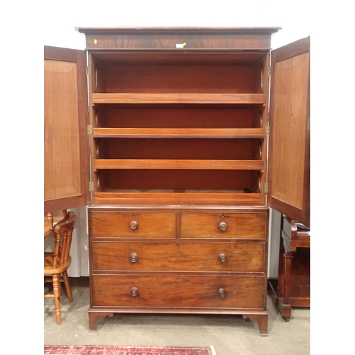 671 - A 19th Century mahogany Linen Press fitted pair of cupboard doors above base fitted two short and tw... 