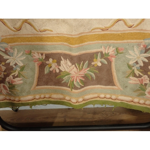 680 - A finely woven Rug, the border having panels of flowers, the central circular panel further decorate... 