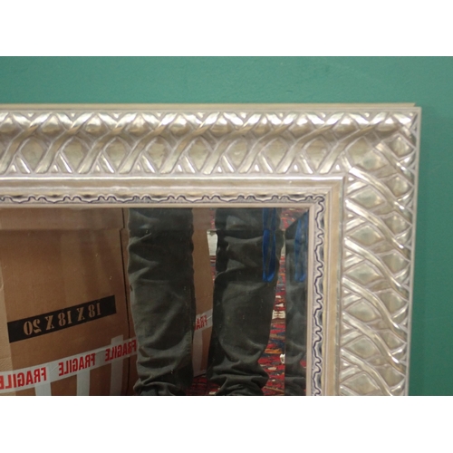 681 - A large modern rectangular gilt framed mirror with carved frame, height: 2ft 7in W x 3ft 6 in H