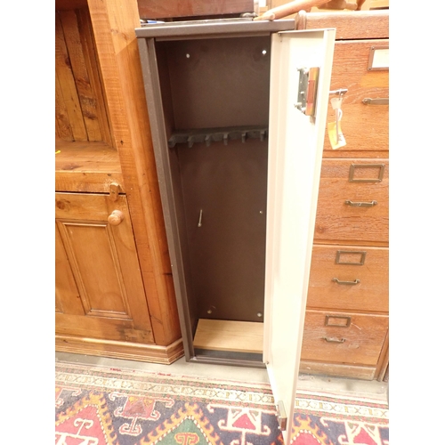 75 - A metal Gun Cabinet with keys 4ft 3in H x 1ft 4in H