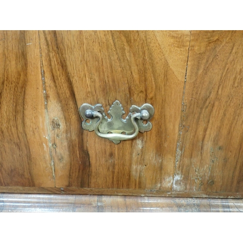 80 - An Georgian style walnut veneered Chest of three short and three long drawers mounted on bracket fee... 