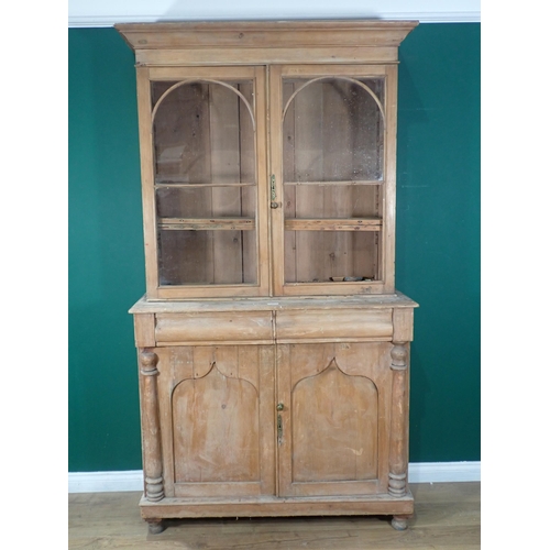 87 - A Victorian pine Bookcase fitted pair of glazed doors (one A/F) above base fitted two frieze drawers... 