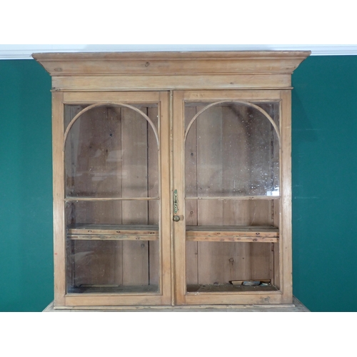 87 - A Victorian pine Bookcase fitted pair of glazed doors (one A/F) above base fitted two frieze drawers... 