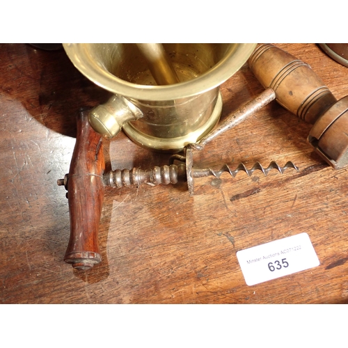 133 - Four Mortars, a Pestle and two antique Cork Screws