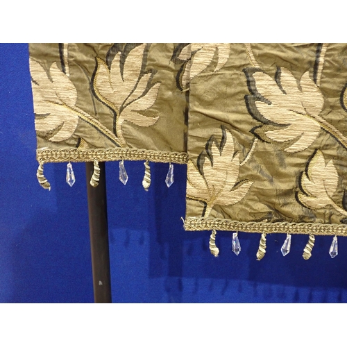 436 - A pair of brocade Door Panels with gold leafage design on brown ground 7ft 8in L x 2ft 7in W