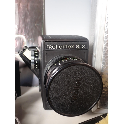 441 - A Rolleiflex 6 x6 Film Camera Outfit,No. 502700018 with Planar 2.8/80mm lens, a Distagon 4/50mm lens... 