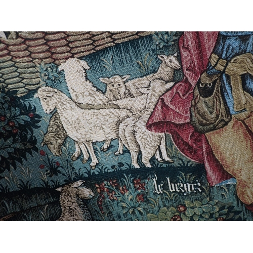 450 - A reproduction Tapestry depicting shepherd and sheep, 4ft 4in x 3ft 2in